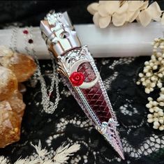 Our 𝕭𝖊𝖑𝖑𝖆 𝖒𝖔𝖗𝖙𝖊 blood vial necklace certainly makes a statement with its large and ornate in your face design now with celestial elements and Swarovski crystal adorned chain Our FAKE BLOOD vial comes pre filled and sealed with our own secret blend of pigments.  All on a stainless steel /or electroplated chain with soldered links for ultimate strength and durability. - 4.5 inch long statement making PLASTIC vial pendant. lightweight and gorgeously detailed.  - Secret formula "vampire bl Blood Jewel Necklace, Blood Necklace Vial, Blood Vial Necklace, Jewelry Vampire, Vampire Core, Necklace Vampire, Vial Pendant, Vampire Necklace, Celestial Elements