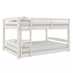 a white bunk bed with two mattresses