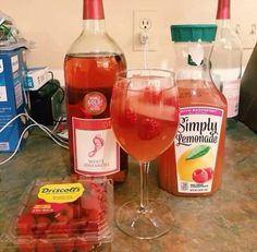 some drinks are sitting on a counter top