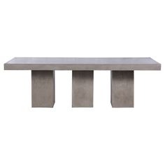 a concrete table with three columns on each side and one column in the middle, against a white background