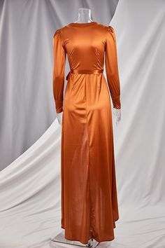 Envelop yourself in luxury with our In Love V-Neck Satin Maxi Wrap Dress. Its sleek, figure-flattering silhouette and soft, satin fabric will make you feel like a goddess. The deep V-neckline adds a touch of sensuality, making it the perfect choice for any special occasion. Elevate your wardrobe with this exclusive piece. Length Floor-Length Style Sexy & Club Fabric Type Satin , Blended fabrics Material Spandex , Polyester Neckline V-Neck Pattern Type Solid Silhouette Asymmetrical Sleeve Length Party V-neck Modal Satin Dress, Stretch Satin Maxi Dress, Satin Party Dress In Solid Color, V-neck Modal Satin Dress For Night Out, V-neck Modal Satin Party Dress, Modal Satin V-neck Party Dress, Fall Satin Maxi Dress For Night Out, V-neck Modal Satin Dress For Date Night, Elegant Long Wrap Dress For Party