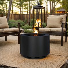 a fire pit sitting on top of a wooden deck