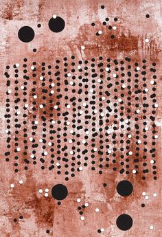 a grungy wall with circles and dots on it