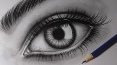 a pencil drawing of an eye with long lashes