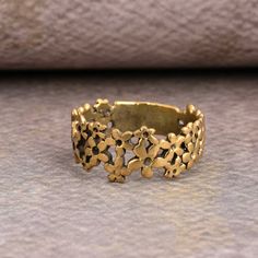 a gold ring sitting on top of a table