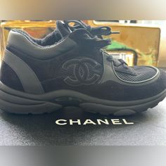 Used Women Chanel Trainers Suede Black Sneakers For Streetwear, Stylish Black Sneakers For Streetwear, Elegant Black Round Toe Sneakers, Black Leather Evening Sneakers, Evening Black Leather Sneakers, Chic Black Leather Sneakers, Elegant Black Evening Sneakers, Chanel Runners, Chanel Trainers