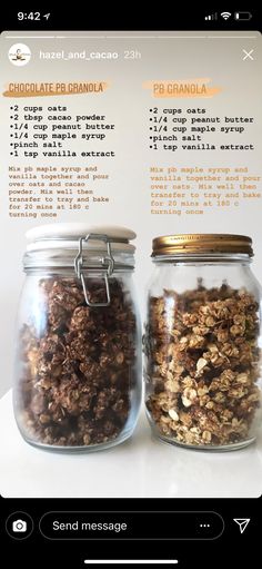 two jars filled with granola sitting on top of a table