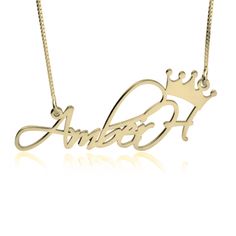 an 18k gold plated name necklace with a crown