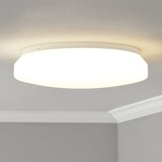 a white ceiling light in a room