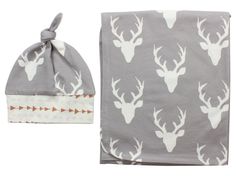 a gray and white deer print baby blanket with matching hat