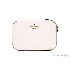 Style: Kate Spade Staci Camera Crossbody Bag (Light Rose) Material: Saffiano Leather Features: Inner Slip Pockets, Zip Closure, Jacquard Lining, Outer Slip Pocket, Adjustable Crossbody Strap Measures: 19.05 cm W x 12.7 cm H x 5.71 cm D Size: S.  Color: Pink.  Gender: female.  Age Group: adult. White Saffiano Leather Travel Bag, White Saffiano Leather Rectangular Bag, Kate Spade Staci, Pink Camera, Mini Light, Leather Camera Bag, Light Rose, Bag Light, Rose Lights