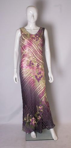 Elegant Multicolor Sequin Gown, Multicolor Sequined Evening Dress For Prom, Purple Sequined Floor-length Evening Dress, Elegant Multicolor Embellished Gown, Elegant Embellished Multicolor Gown, Purple Dress With Sequined Fitted Bodice, Purple Dress With Sequins And Fitted Bodice, Multicolor Sequined Evening Dress For Gala, Purple Sleeveless Dress With Contrast Sequin