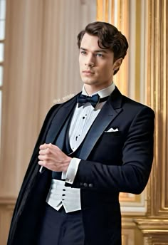 a man in a tuxedo and bow tie is posing for the camera with his hands on his hips