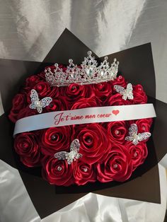 a bouquet of red roses with a tiara on top that says it's time for me to grow