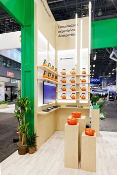 a display area with shelves and orange pots