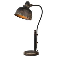 an antique style lamp with a metal shade on the base and a black iron finish