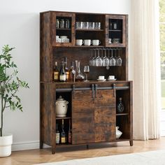 a wooden cabinet filled with wine glasses and bottles