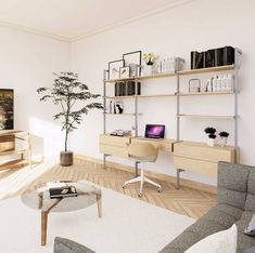 a living room filled with furniture and bookshelves next to a plant in a vase