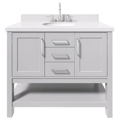 a white bathroom vanity with drawers and a sink