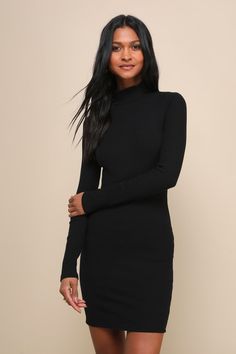 You'll look absolutely marvelous in the Lulus Dashing Black Ribbed Mock Neck Long Sleeve Bodycon Mini Dress! Stretchy cotton-blend ribbed knit shapes this chic and classic dress that has a mock neckline, fitted long sleeves and a bodycon silhouette that ends at a flirty mini hem. Pair this dress with strappy sandals to take your look to the next level! Fit: This garment fits true to size. Length: Mid-thigh. Size medium measures 33.5" from shoulder to hem. Bust: Great for any cup size. Waist: Fitted - stretchy fabric allows custom fit. Hip: Fitted - stretchy fabric allows room for hips. Undergarments: May be worn with any standard bra. Fabric: Fabric is very stretchy. Unlined. 95% Cotton, 5% Spandex. Hand Wash Cold. Do Not Bleach. Line Dry. Iron Low Heat. Imported. Lulus | Dashing Black Rib Women's Professional Clothing, Cute Business Casual, Trendy Work Outfit, Professional Clothing, Professional Outfits Women, Work Dresses For Women, Mini Bodycon Dress, Mock Neck Dress, Mock Neck Long Sleeve