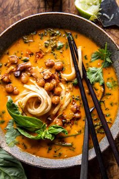 a bowl of soup with noodles and vegetables