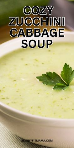 a white bowl filled with soup and garnished with parsley on the side