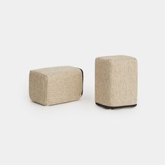 two small stools sitting next to each other