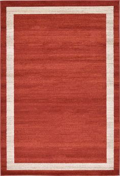 a red area rug with white border