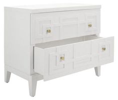 a white dresser with two drawers and gold pulls on the bottom drawer, against a white background