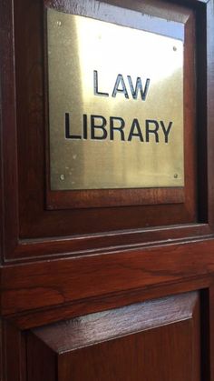 the law library sign is on the door