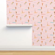 a pink wallpaper with surfers on it