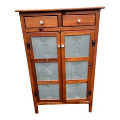 an old wooden cabinet with glass doors