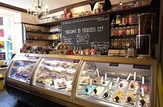 a display case in a store filled with lots of food