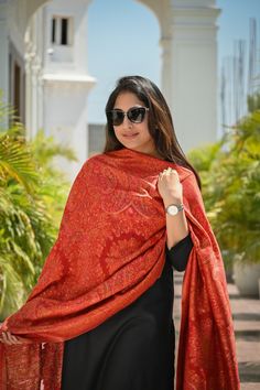 Red Kani Jamawar dupatta in silk fabric has been meticulously woven into rich & traditional floral motifs and vibrant colour palette to suit all eyes. This gorgeous and rich Kashmiri Pashmina Silk Dupatta is suitable for any celebration or gathering. Be it a wedding function or a festive celebration, it adds colour and vibrance to your outfit as you team it with salwar suit/ kurta set for an ethnic look or simply don with any modern outfit for that contemporary look. Colour: Red Craft: Kani Weave Fabric: Silk Dimensions:                 L - 2.45 m                 W - 0.95 m Traditional Pashmina Silk Scarf For Wedding, Wedding Pashmina Dupatta Shawl, Wedding Pashmina Shawl Dupatta, Wedding Silk Pashmina Dupatta Scarf, Jamawar Silk Shawl Dupatta, Pashmina Silk Scarf For Wedding With Traditional Drape, Wedding Pashmina Silk Scarf In Traditional Drape, Wedding Pashmina Silk Scarf With Traditional Drape, Jamawar Shawl With Traditional Patterns For Wedding