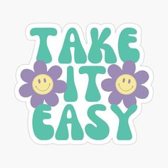 a sticker with the words take it easy and two purple flowers in front of it