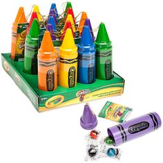 crayons are lined up in a display case