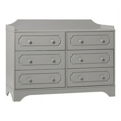 a white dresser with drawers and knobs