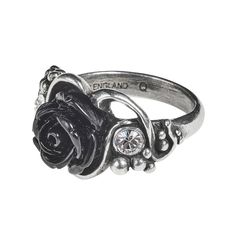 Bacchanal Rose Ring A beautiful polished pewter rose and grapevine design ring with a black resin rose in the center, and a clear crystal Swarovski gem on either side. Materials: Fine English Pewter, Clear Swarovski Crystals, Black Resin Rose. Height 0.67" x Width 0.98 " x Depth 1.18" Weight: 0.02 lbs. Brand: Alchemy Of England. See the matching Necklace here. How To Measure Your Ring Size: Cut a strip of paper no wider than 6mm. Wrap the paper around your finger, and mark the paper where it mee Punk Witch, Occult Jewelry, Black Rose Ring, Vanessa Redgrave, Alt Goth, Alchemy Gothic, Resin Rose, Vine Ring, Fall Rings