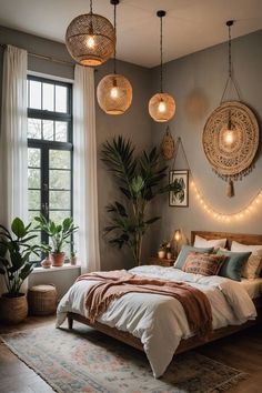 a bedroom with two hanging lights above the bed