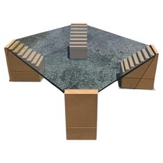 a table that is made out of cardboard and concrete