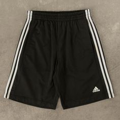 Men's Vintage Adidas Sport Shorts  + Closure: Drawstring  + Colour: Black  + Size Label States: Medium  + Actual measurements (inches): Medium  + Measurements (Inches): Hem = 12, Rise = 13  Please note that all vintage items have been previously worn, and may show some signs of previous wear. However, any significant damage will be photographed and/or stated in the items listing. Please note that damage to the inside may not always be photographed or listed. Short Adidas, Adidas Short, 90s Fashion Men, Black Shorts Men, Shorts Adidas, Adidas Vintage, Adidas Shorts, Adidas Sport, Size Label