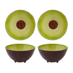 two avocado bowls with one cut in half and the other empty, on a white background