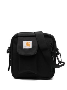 Essentials logo patch messenger bag from CARHARTT WIP featuring black, logo patch to the front, adjustable shoulder strap, top zip fastening and main compartment. Carhartt Wip Essentials Bag, Carhartt Bag, Wip Bag, Carhartt Logo, Chloe Purses, Streetwear Accessories, Carhartt Work In Progress, Burberry Hat, Linnet