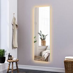 The copper-free mirror is fitted with an integrated LED strip light and add a touch of contemporary style to any bathroom setting. Display it either vertically or horizontally to suit your needs. Elevate your modern bathroom with the frameless mirror, it'll have both you and your home looking better. Light up your day with our LED wall mount bathroom make up mirror today! Wrought Studio™ | Wrought Studio™ LED Backlit Rectangle Wall Mirror w / Smart App Control brown / white | 48" H X 12" W X 1" Over The Door Mirror, Rectangle Wall Mirror, Make Up Mirror, Frameless Mirror, Rectangle Mirror, Metal Mirror, Hanging Mirror, App Control, Accent Mirrors