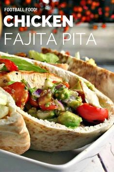 chicken fajita with tomatoes, avocado and lettuce on it