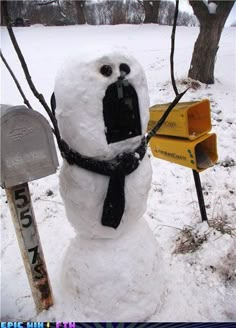 there is a snowman with a black tie on