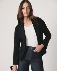 A blazer is a must. And in our premium ponte fabric, equipped with 4-way stretch, this piece is even more timeless (and comfortable). A traditional lapel and darting at the back are the definition of easy tailoring for a crisp, put-together look. A perfectly versatile piece, it can be seamlessly paired with any of our SPANXsmooth™ PerfectFit Ponte pants or your favorite pair of jeans. | Spanx Women's Ponte Blazer Top Blazer Top, Ponte Pants, Style Board, Classic Black, Coats Jackets, Blazer, My Style, Clothes For Women, Pants