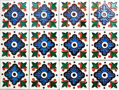 several colorful tiles with different designs on them