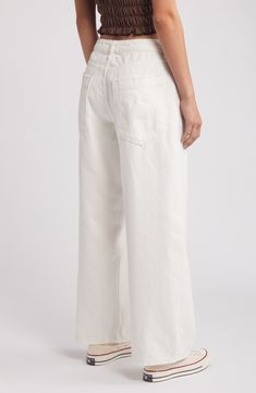 Add a fresh element to your denim collection with baggy jeans boasting a wide-leg silhouette and clean white hue that pairs with any ensemble. 27 1/2" inseam; 21" leg opening; 12 1/2" front rise; 15" back rise (size 29) Exclusive retailer Zip fly with button closure Five-pocket style 100% cotton Machine wash, line dry Made in Turkey Low Rise Wide Leg Jeans, Bdg Urban Outfitters, Cotton Jeans, Denim Collection, Wide Legs, Fabric Gifts, Free Fabric, Anniversary Sale, Baggy Jeans