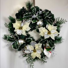 a christmas wreath hanging on the wall